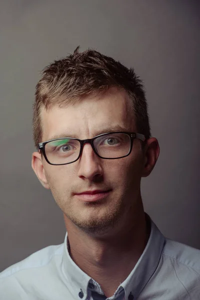 Portrait of a smart serious young man — Stock Photo, Image