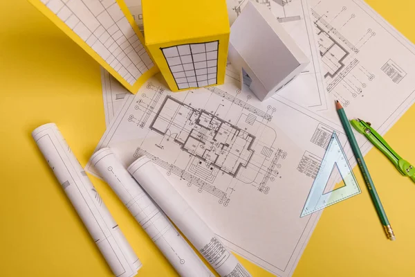 White family paper house, house projects plan and blueprints in — Stock Photo, Image