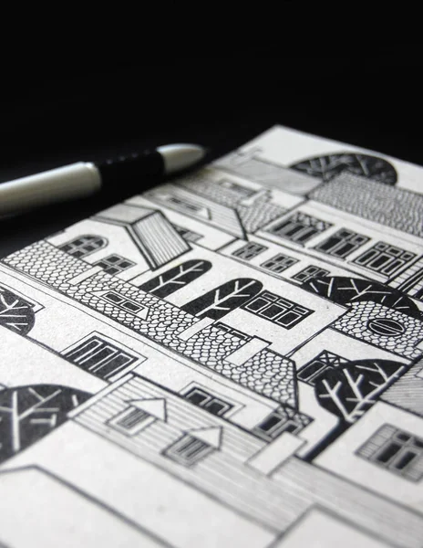 illustrated city with cute buildings and trees in black and white