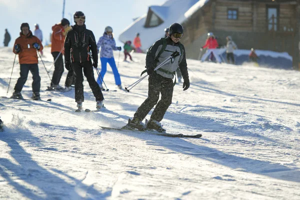 Skiers on training slope — Stock Photo, Image