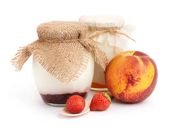 Yogurts in jars with fruits — Stock Photo, Image