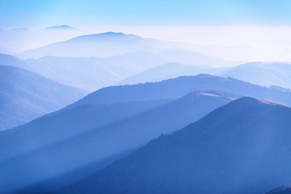 Mountains silhouettes in perspective