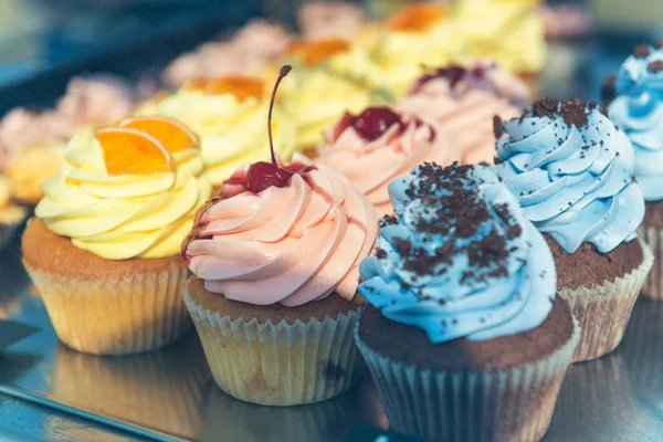 Various cupcakes on a street food festival. — Stock Photo, Image