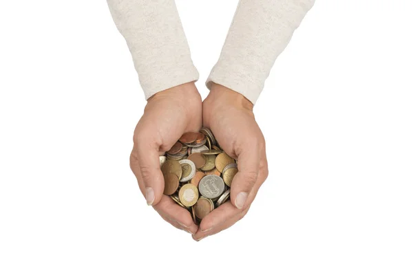 Manos femeninas llenas de varias monedas . — Foto de Stock