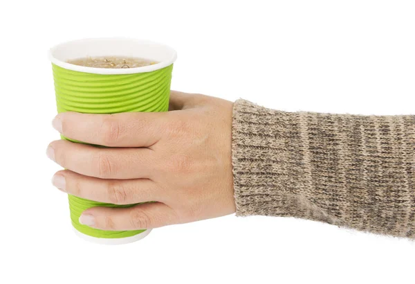 Hand giving warm herbal tea — Stock Photo, Image
