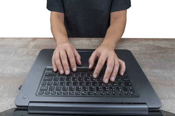 Hands on laptop keyboard.