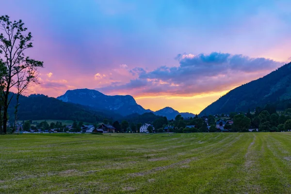 Beautiful sunset in alpine valley — Stock Photo, Image