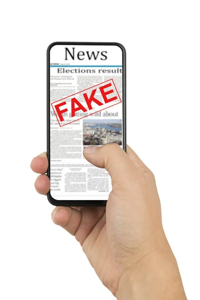 Hand holding smart phone with a fake news page — Stock Photo, Image