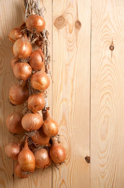 Ripe onion on a wood Stock Photo