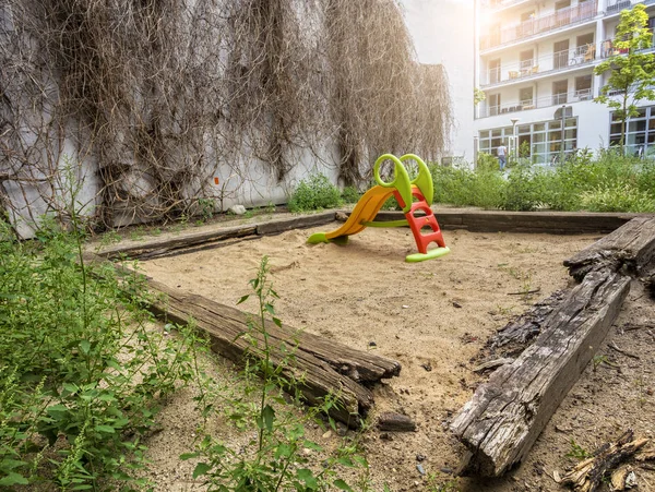 A neglected children's playground on a farm in Berlin — Stock Photo, Image