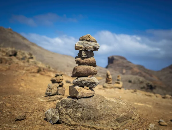 Stacked up small stones in the mountains — Stock Photo, Image