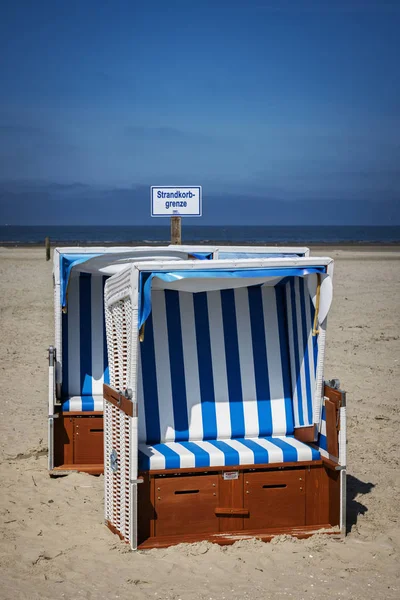 Blue white striped Beach baskets at the North Sea in Sankt Peter Ording — Stock Photo, Image