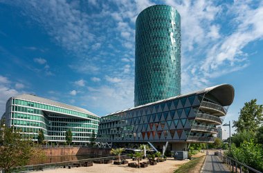 the main in frankfurt with the westhafen tower in the new residential area at the westhafen