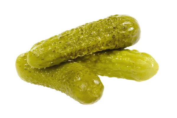 Three pickled  cucumbers.  Gherkins. — Stock Photo, Image