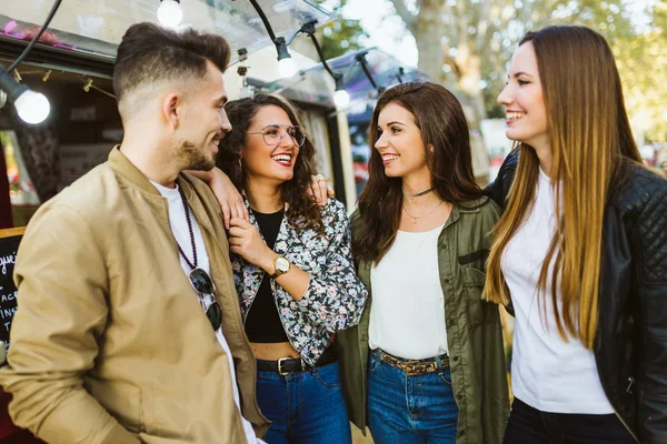 Group of friends enjoying time in the street. — Stock Photo, Image