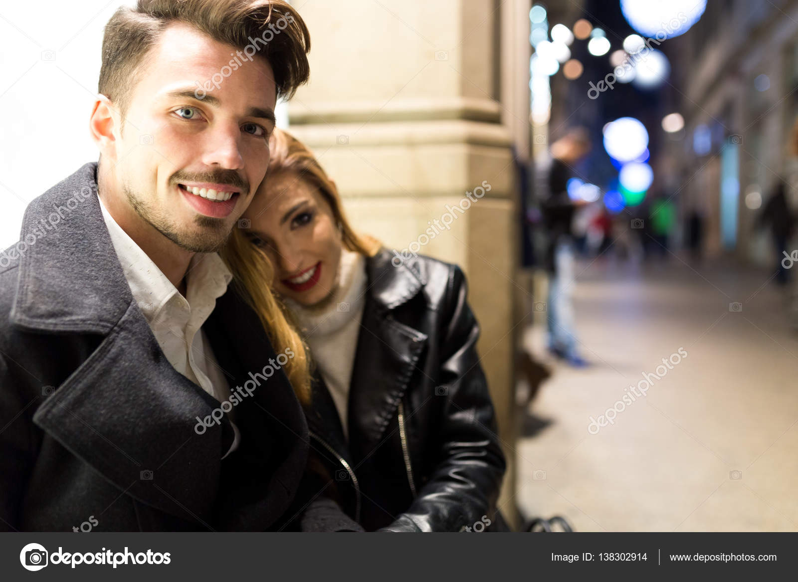 Beautiful young couple in love on the street. Stock Photo by ©nenetus ...