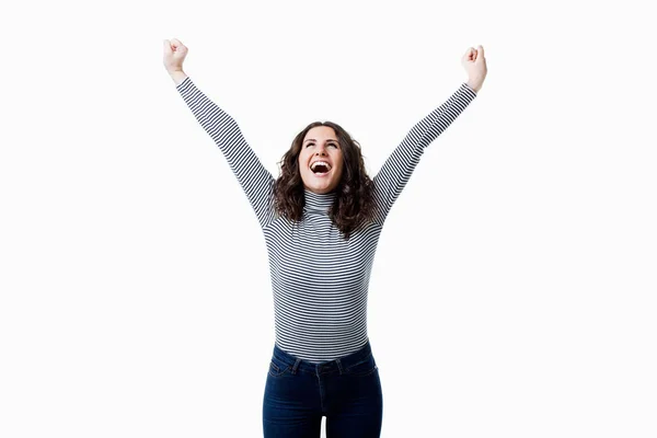 Hermosa joven celebrando algo. Aislado sobre blanco . —  Fotos de Stock