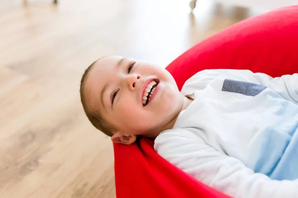 Beautiful young boy having fun at home. — Stock Photo, Image