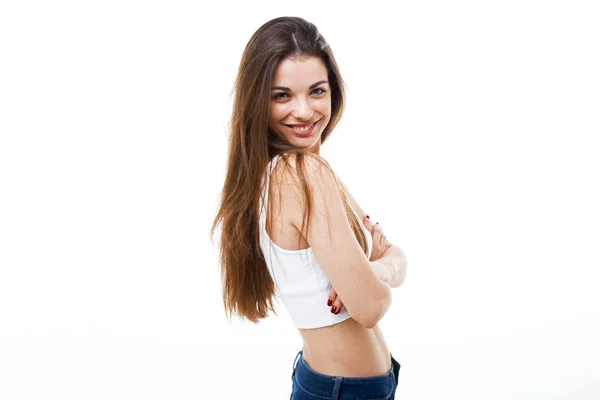 Hermosa mujer joven mirando a la cámara sobre fondo blanco . — Foto de Stock