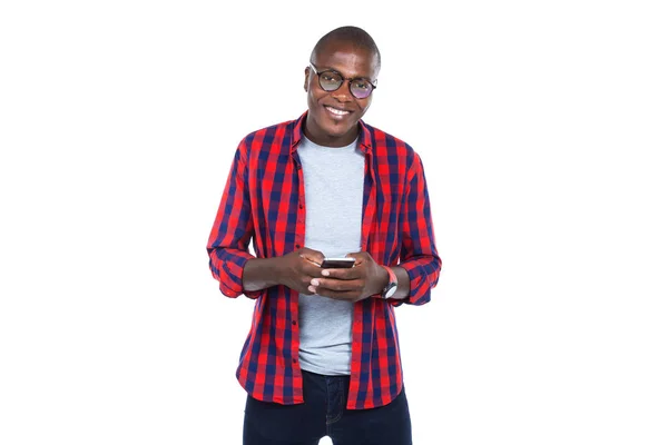 Handsome young man using his mobile phone. Isolated on white. — Stock Photo, Image