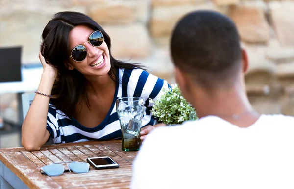 Beautiful young couple drinking refreshment in the restaurant. — Stock Photo, Image