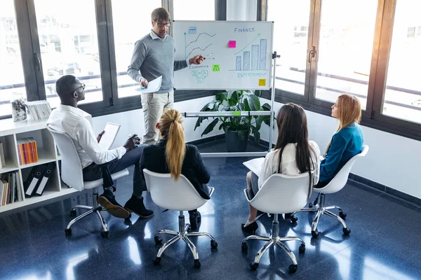 Shot Handsome Businessman Pointing Whiteboard While Explaining Project His Colleagues — Stock Photo, Image