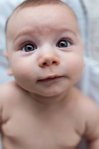 Shot Happy Baby Looking Camera While Lying White Sheet Home — Stock Photo, Image