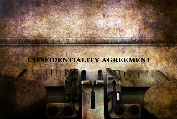 Confidential agreement on typewriter — Stock Photo, Image
