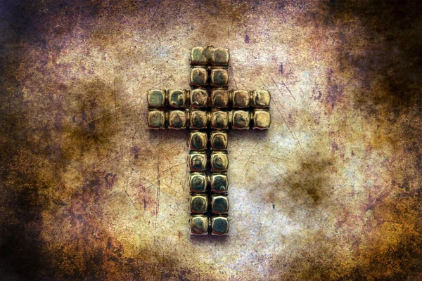 Metal cross on grunge background — Stock Photo, Image