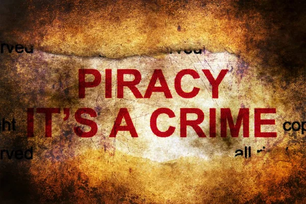 Piracy it's crime grunge concept — Stock Photo, Image