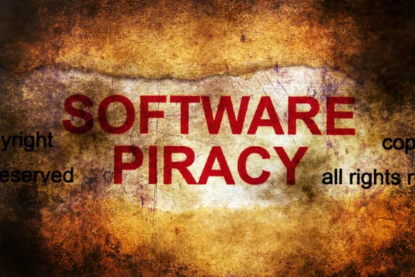 Software piracy grunge concept — Stock Photo, Image