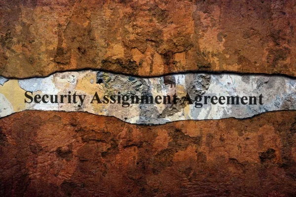 Security agreement text on wall — Stock Photo, Image