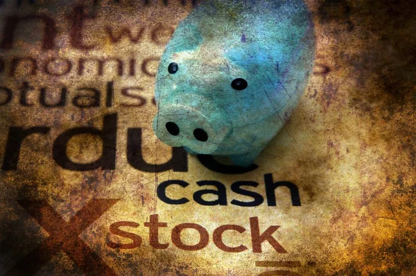 Piggy bank en voorraad grunge-concept — Stockfoto