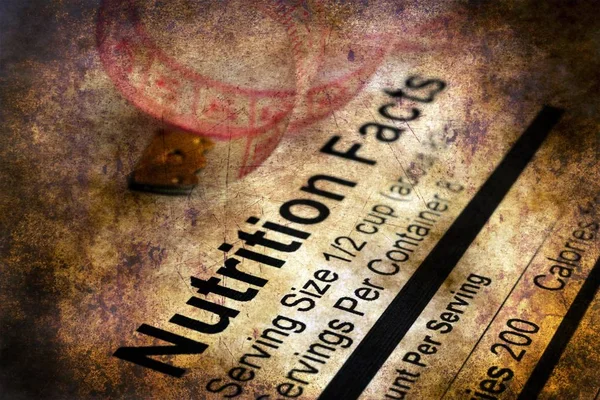 Nutrition facts and measure tape grunge concept — Stock Photo, Image
