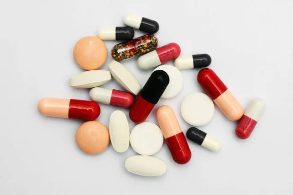 Pills close up over white — Stock Photo, Image