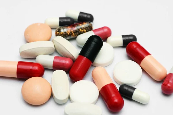 Pills close up over white — Stock Photo, Image