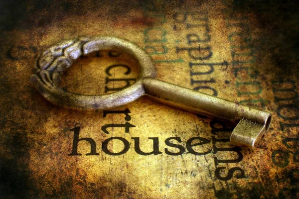 Key on housing grunge background — Stock Photo, Image
