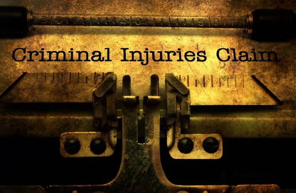 Criminal injuries claim grunge concept — Stock Photo, Image