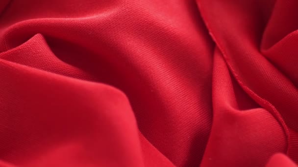 Red satin fabric background slow motion — Stock Video