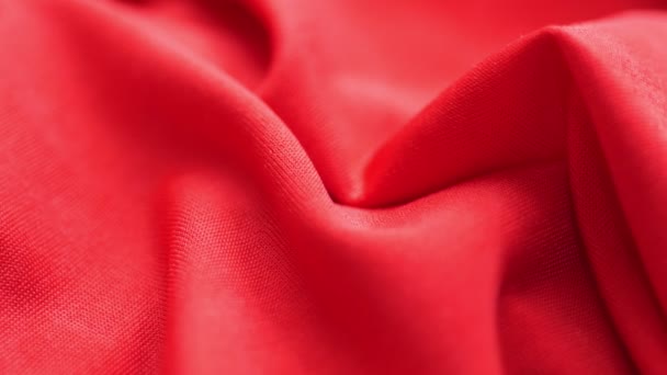 Red satin fabric background slow motion — Stock Video