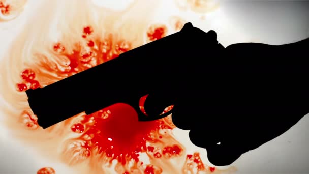 Pistole silueta proti krvavému pozadí — Stock video
