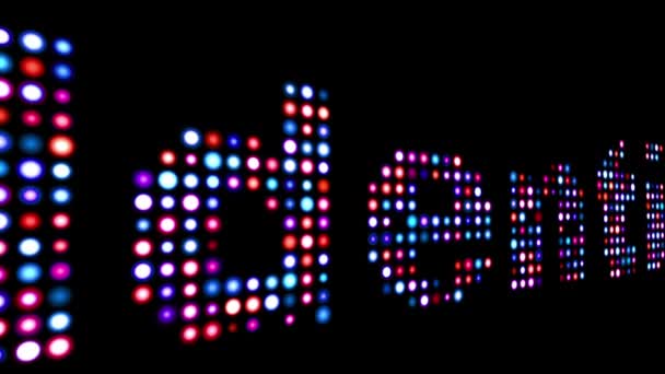 Identity colorful led text over black — Stock Video