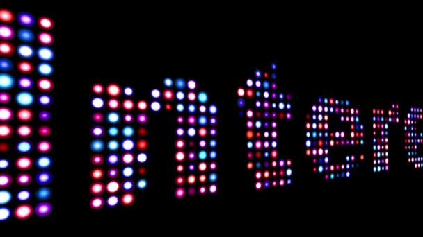 Interest colorful led text over black — Stock Video