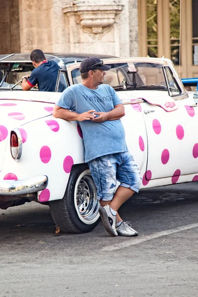 Driver of Pink Polka Dot Convertable Stock Image