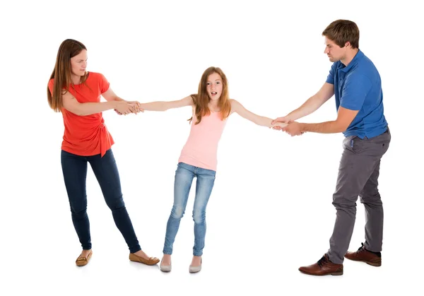 Unhappy Couple Pulling Their Daughter — Φωτογραφία Αρχείου