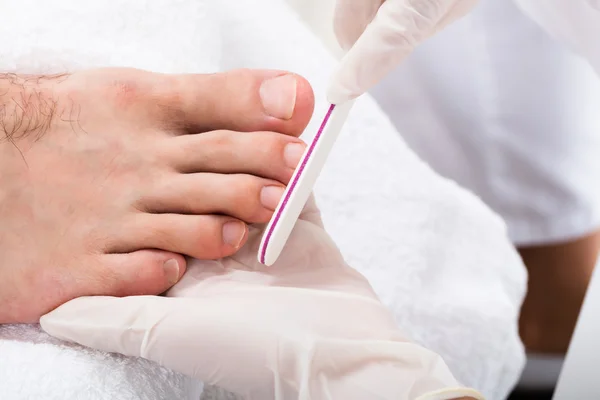 Beautician Hand Filing The Nails — Stock Photo, Image