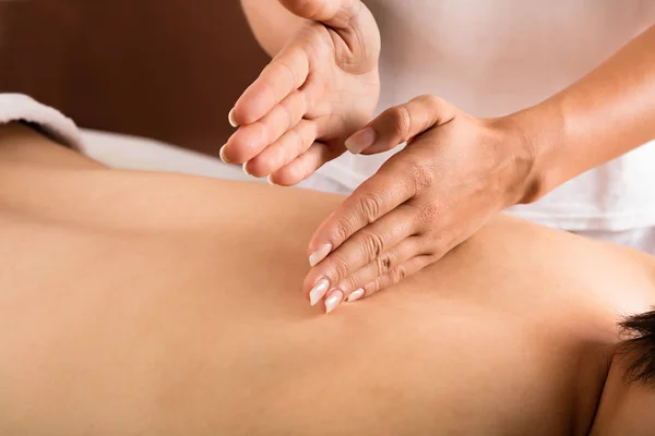 Close-up Of A Man Receiving Back Massage — Stock Photo, Image
