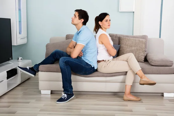 Couple Sitting Back To Back — Stock Photo, Image