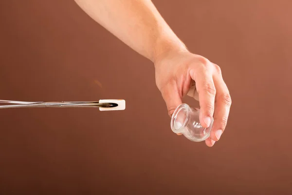 Therapist Holding Lit Camphor — Stock Photo, Image