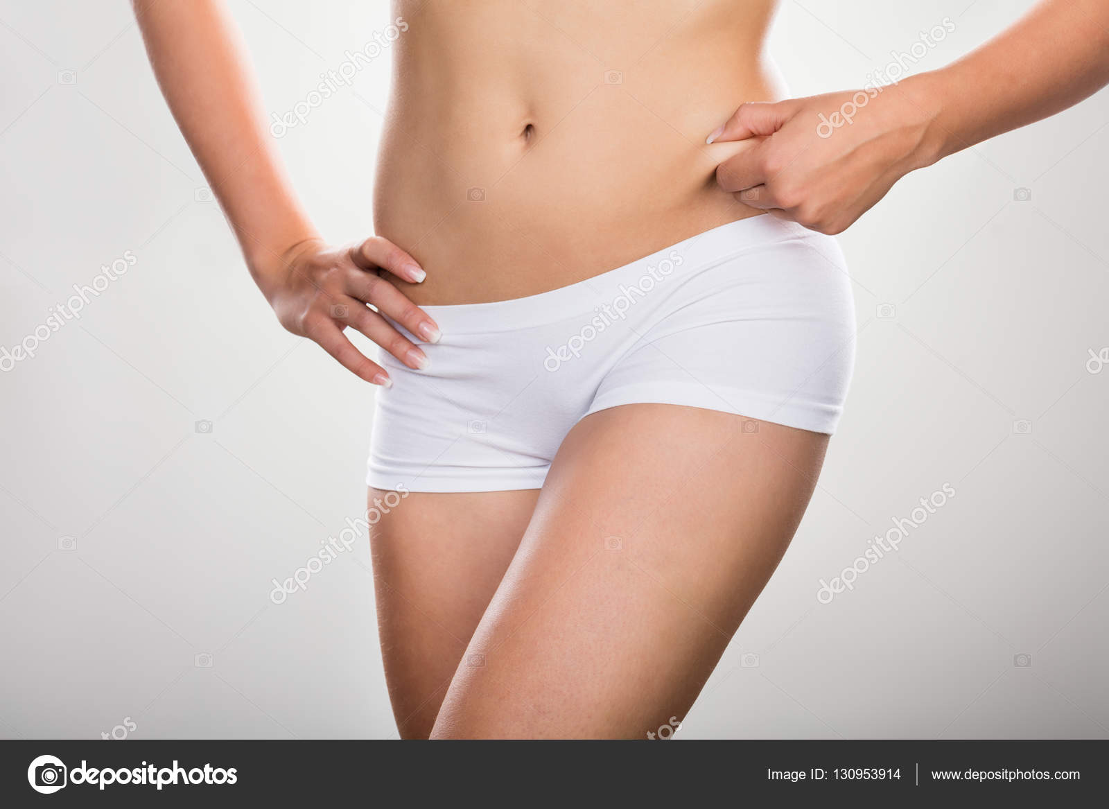 Young woman in white panties Stock Photo by ©AndreyPopov 130953914